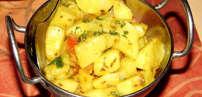 Indische Kartoffelbeilage mit Kmmel und Petersilie ausgarniert!